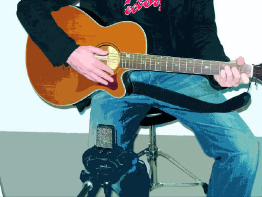 Point your mic at the point where the guitar's neck and body meet.